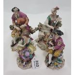 Matching pair of fine porcelain late 19th C table figures, musicians with sheep and dog at feet (