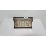 Late 19th C adjustable date calendar, with hallmarked Birmingham silver front panel, (not