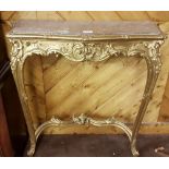 Regency Gilt Console Table, a serpentine shaped red marble top, over the decorative frieze carving