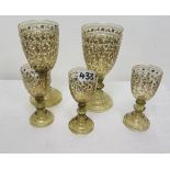 Pair of 19thC green wine glasses with gilt overlay and 3 matching smaller glasses (5)