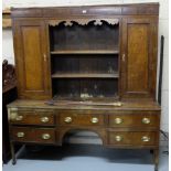 19thC Oak Dresser, an upper gallery with two doors and 2 open shelves, over a base with 5 drawers,