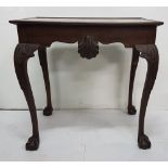 Late 19th C mahogany silver table, raised rim over shell shaped moulding, on cabriole legs and