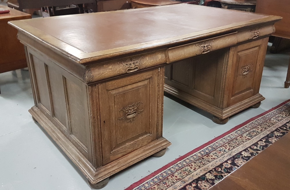 Carved oak kneehole partner's desk, with 3 apron drawers over 3 small drawers, with masked - Image 2 of 2
