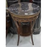 Early 20thC French Circular Occasional Table with elaborate gilt mounts featuring goat masks,