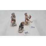 Matching pair of Dresden miniature figurines, marked at base, boy with grapes, girl with birds (