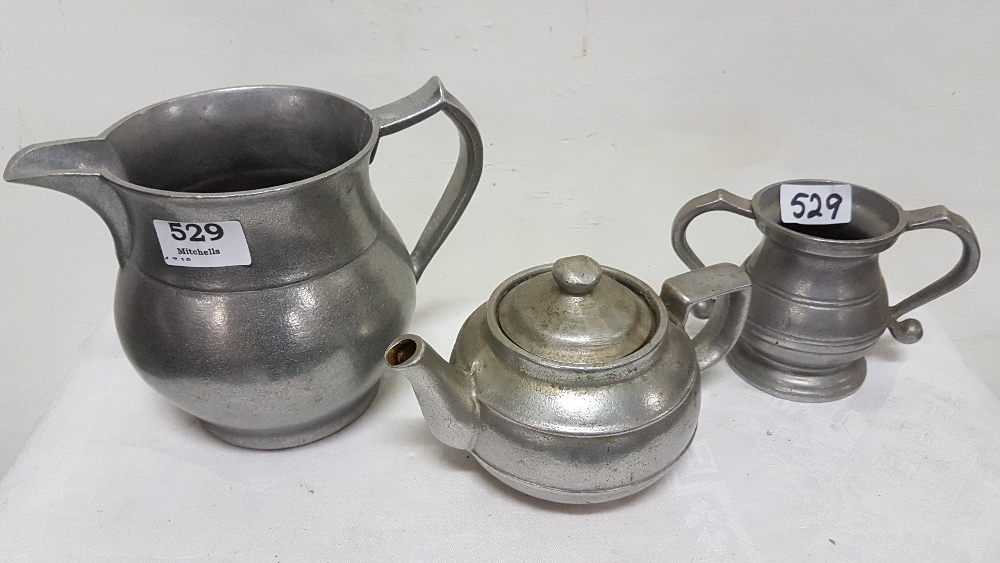 American pewter teapot stamped RWP, large pewter water jug and a pewter sugar bowl and jug (4)