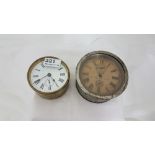 2 old car clocks – 1 German, stamped “WT Duthie, Athy” & 1 brass cased (2)