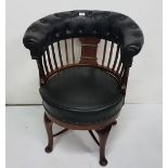Late 19th C swivel, bow shaped library chair with black leather covered padded top and similar seat,