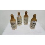Group of 4 Victorian stoneware beer bottles, all from Londonderry, each 8”h
