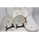 A set of 8 Wedgewood dinner plates (Diam.-10 ins, 26 cms) with a coral rim on a white ground bearing