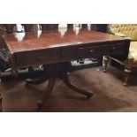 William IV mahogany sofa table with drop side leaves with one faux drawer and one pull out drawer on