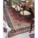 Persian Wool Floor Rug, red central ground with multiple navy ground borders, 2.8m x 3.6m