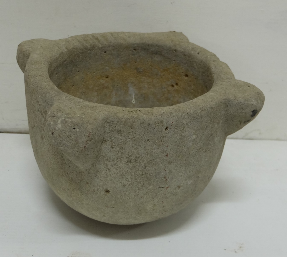 Large 18th C stone mortar, 19cms H, 24cms W.Provenance Clonbrock House, Co. Mayo