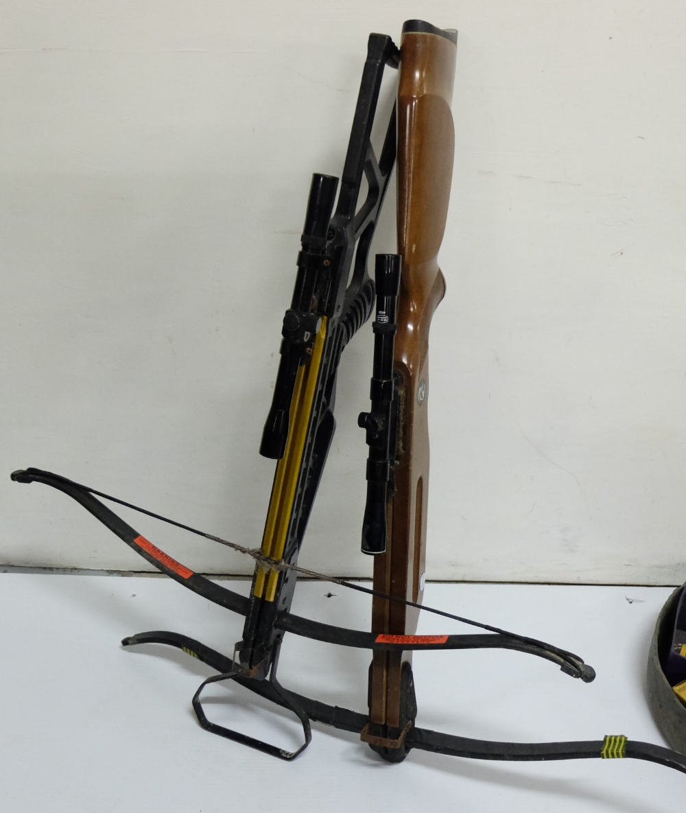 2 x crossbows with lenses