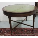 Circular Centre /Games Table, with a green leatherette top, tapered legs, 42” dia