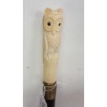 Gents Walking Stick, mounted with a figure of an owl, on a finely turned mahogany base, 38”h