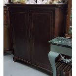 Two Door Mahogany Side Cabinet, the two doors enclosing shelves, inlaid, bracket feet, 44”w x 50”h