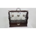 Mahogany and silver plated tantalus case including a set of 3 cut glass square shaped decanters with