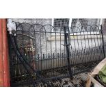 Pair of Good Quality Cast Iron Entrance Gates, painted black, the overlapping ovals along the top