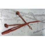 3 large iron forge tools painted red, including a tongs and chisel (3)