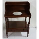 Late 19th C mahogany washstand with basin well and stretcher drawer, gallery shelf, 30"w x 41"h