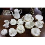 2 bone china part tea sets – white with gold rims - one Royal Tuscany, one Minton