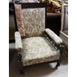 Walnut framed Edwardian Armchair on turned legs, later casters, beige floral fabric, for