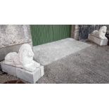 Matching Pair of Seated Garden Lions, each 34”l x 19”h (concrete)