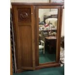 Edwardian walnut wardrobe with 2 doors, one panelled, one mirrored, 56”w x 78”h x 20.5”d