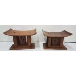 Matching Pair of African Stools, the low-sized curved seats over decorative internal fretwork,