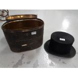 Old Top Hat, with a tin hat carrying case
