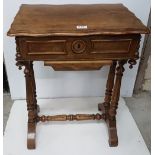 Edwardian Work Table, the hinged top enclosing sewing compartments, on turned legs, with a stretcher