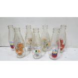 7 commemorative glass milk bottles – Italia ’90, 1988 Dublin etc