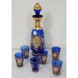 Venetian blue glass wine decanter with gold highlights and a set of 6 matching small wine glasses (