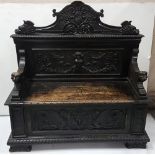 19thC Carved Italian Oak Hall Bench, the shaped pediment featuring carved masks, atop an angel