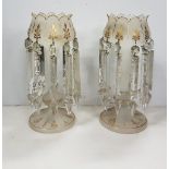 Matching pair of Victorian cameo glass lustre drop table centrepieces with gold highlights, complete