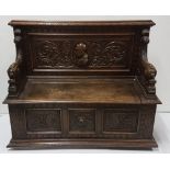 19th Century Continental Oak Hall Bench, the carved back panel featuring a mask of possibly an
