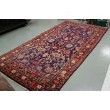 Blue ground Iranian Carpet with a traditional all-over floral design, 3.14m x 1.70m