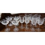 2 X Shelves of cut glass dessert bowls on stems (6 + 2 + 5) and set of 7 cut glass wine glasses (not