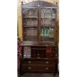 Fine Georgian Mahogany Secretaire Bookcase, the dome shaped pediment and two brass finials over