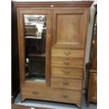 Edwardian walnut Wardrobe, a mirrored door enclosing hanging robe, with 4 short drawers and 1 long