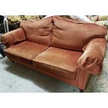 Modern 2-seater Sofa, red velour upholstery, on turned legs