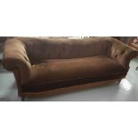 Victorian Roll Back Settee, upholstered with brown velour fabric, on round mahogany legs, modern