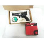 Webley Tempest Air Pistol, with a box of paper targets