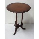 Circular mahogany occasional table, on 3 pillar supports, 19”dia