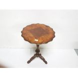 Elm Occasional Table, the shaped top over a naturalistically styled pod and feet, 30”h x 8” dia