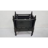Arts and Crafts Ebonised Canterbury, with a drawer, on tapered legs, 21” w