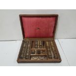 Set of optician's lenses, in original oak carrying case (labelled T Mason, Dame St, Dublin)