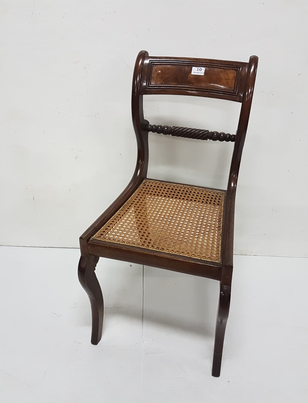 Regency Mahogany Dining Chair, polished, the curved and scrolled back atop a bergere seat and