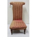 Victorian Prie Dieu chair on turned mahogany legs, large brass casters